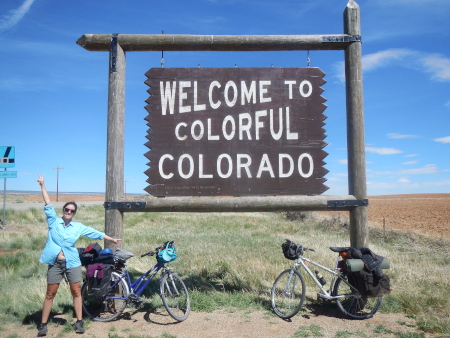 We cross the border of Colorado and stop to take a picture with the sign, Colourful Colorado