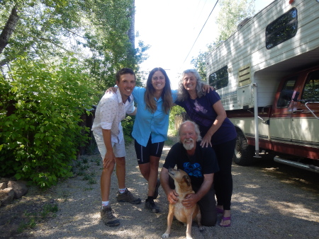 Saying goodbye to Jim, Jen and Eddie with their house and campervan in the background