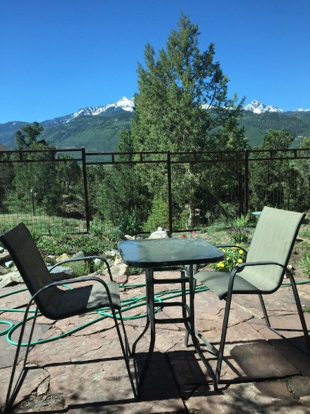 The only way to wake up in Ridgway, with the mountains framed from the window