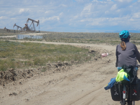 Cycling past old oil fields  in the Grand Basin whipped by the wind