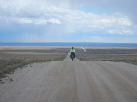 Road extends into the distance over the flat Grand Basin
