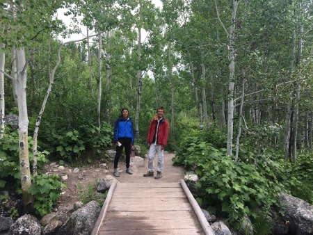 Jacob and Rob on a morning stroll to the lakes by a foot bridge