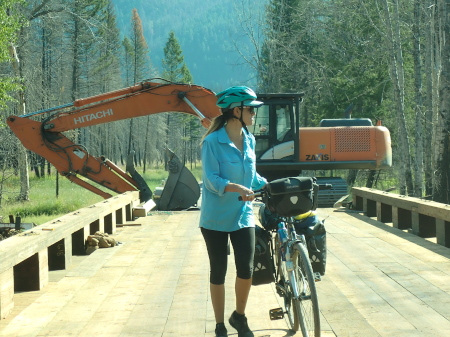 Naughty Ruth crossing a blocked off bridge with a JCB in the background