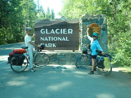 Ruth and Rob with the entrance sign to Glacier National Park