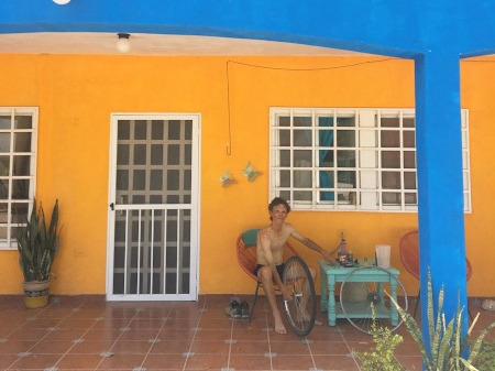 Rob fixing the bikes in our little Mexican house