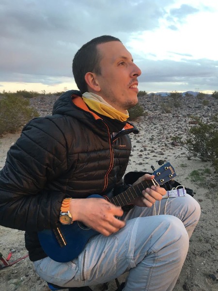 Playing music at wild camping spot