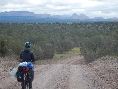Ruth cycling into the distant scenery