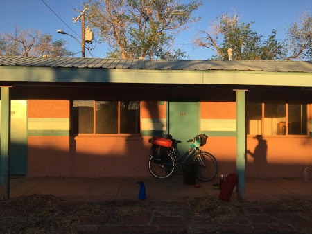 Abandoned motel door where we camped for the night