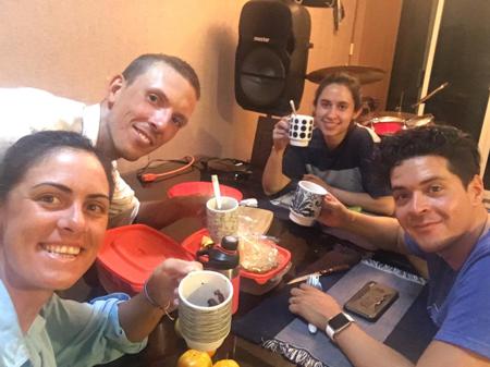 Ruth and Rob having a cuppa with Daniela and Octavio around the table